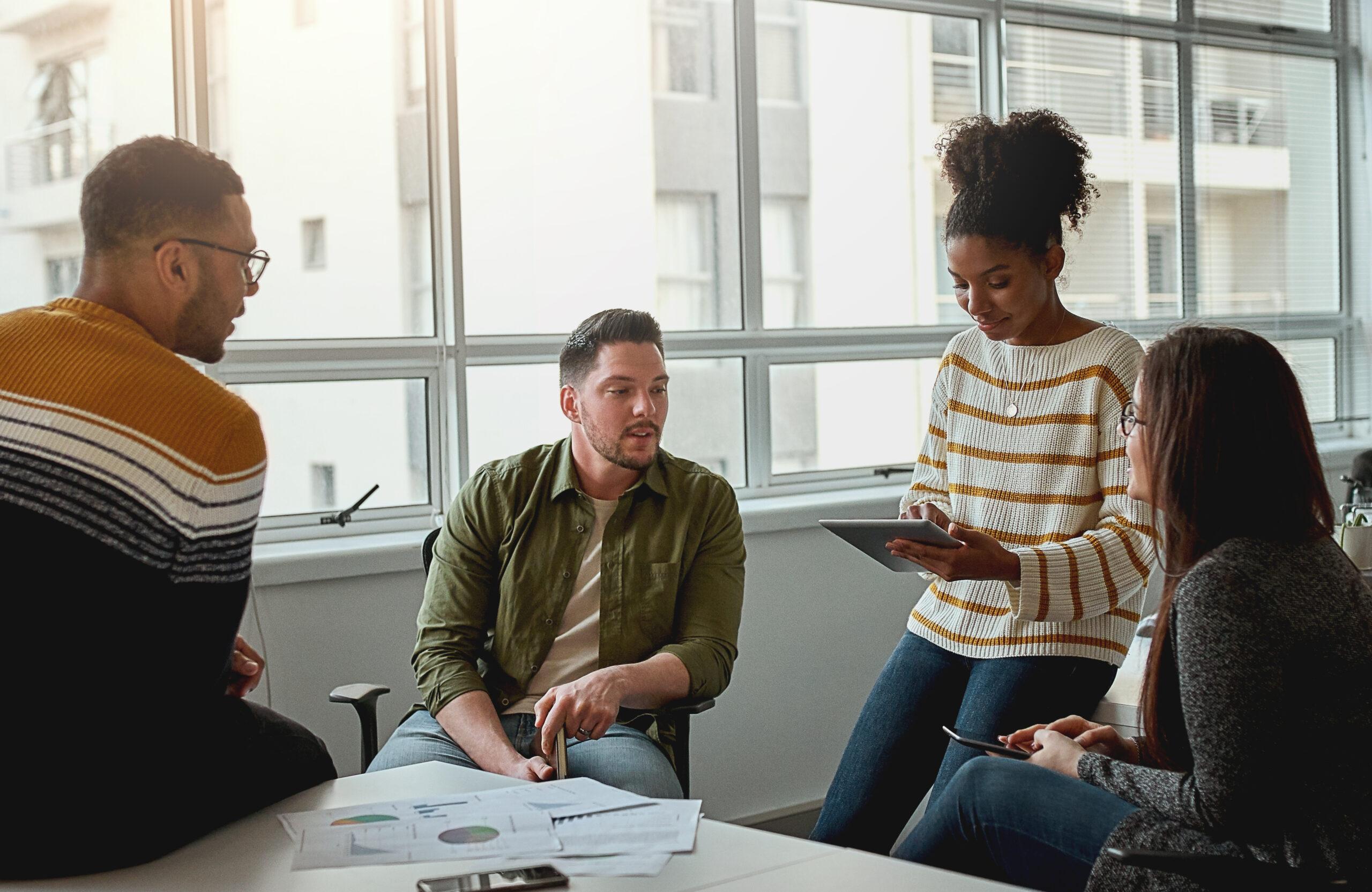 Creative team discussing new strategy of their company